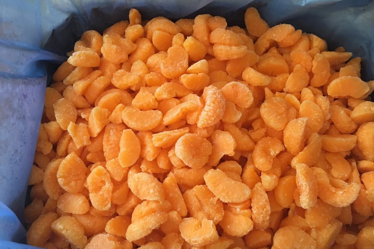 Check the actual segment texture A separate portion of mandarin segments showing individual juice sacs and outer membrane