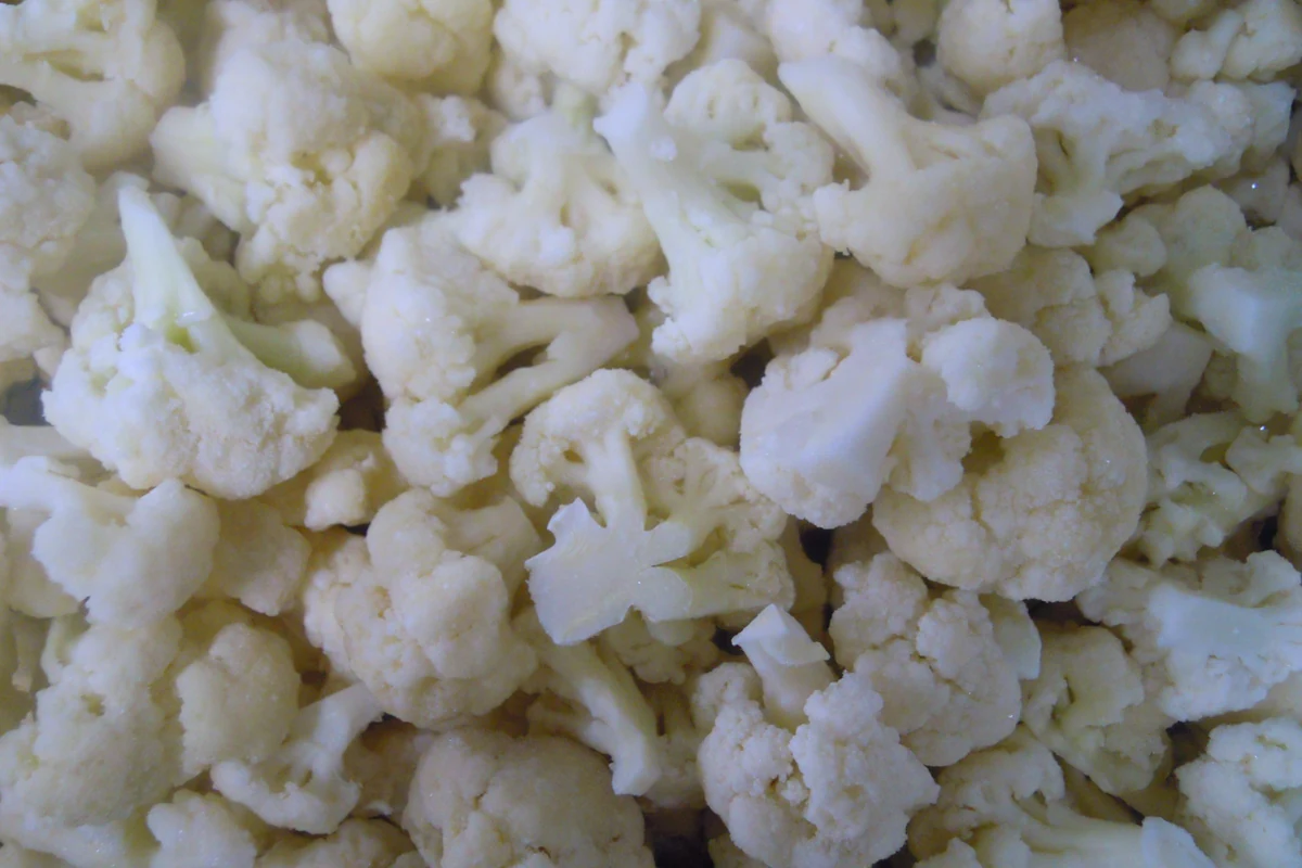 Cauliflower floret structure White cauliflower florets with branching crowns and pale attached stems